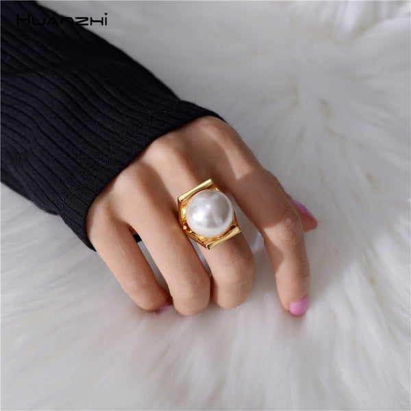 HUANZHI Imitation Pearls Personality Gold Color Metal Hollow Exaggeration Design Finger Rings for Women Girls Party Jewelry Gift